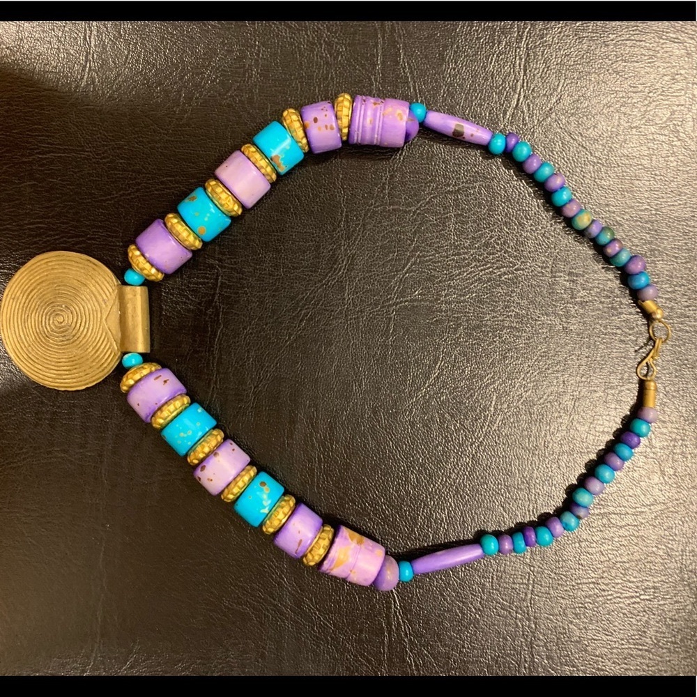 Gold medallion necklace